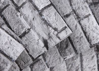 O papel de parede de vista real cinzento não tecido do tijolo gravou 3D o efeito, tamanho de 0.53*10M
