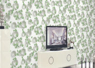 As plantas verdes e o teste padrão redondo 3D gravaram o tratamento de superfície do papel de parede